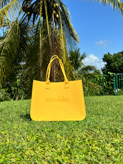 Moodelier Tote bag in color sunflower/yellow. Made out of recycled plastic. Great for everyday.